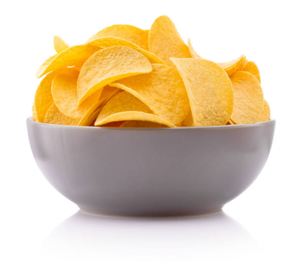 istock Potato chips in bowl isolated on white background 2159483919