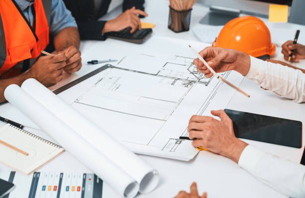 istock Diverse group of civil engineer and client working on architect. Prudent 2159486435