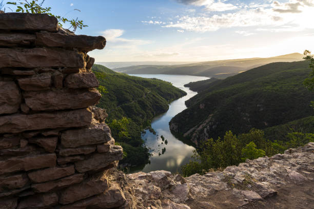 Tiber river into the narrow gorge, Umbria, Italy Tiber river seen from above while flowing in a lush canyon, Umbria, Italy, Europe tiber river stock pictures, royalty-free photos & images