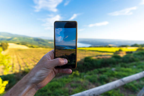 istock Tourist photographing vineyards with smartphone 2159488982