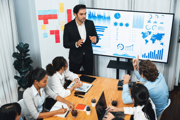 istock Wide top view diverse analyst team analyzing financial data. Habiliment 2159494928