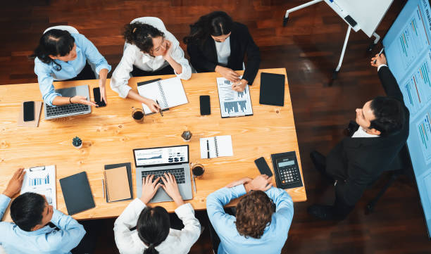 istock Multi ethnic diversity business people and modern business project. Habiliment 2159497238