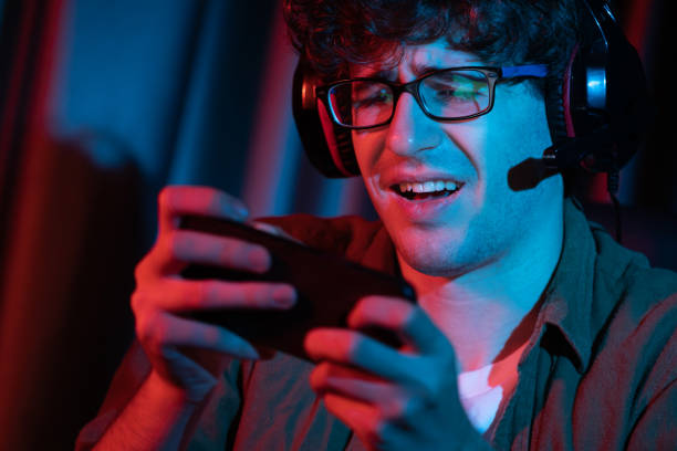 istock Stressful streamer team playing with Esport on phone with harder game. Gusher. 2159497545