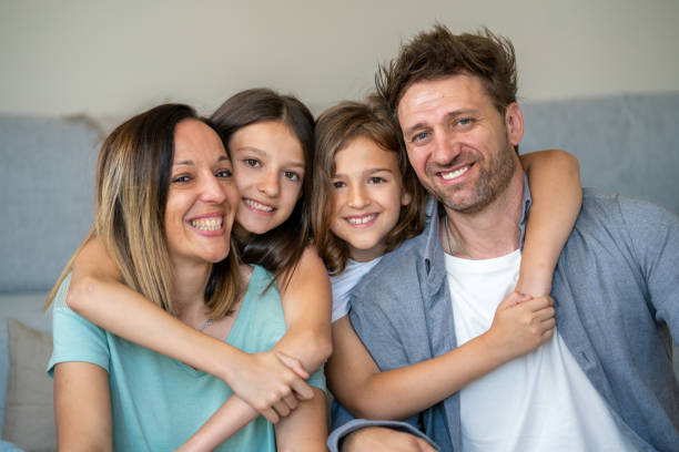 istock Family relaxing together at home 2159497997