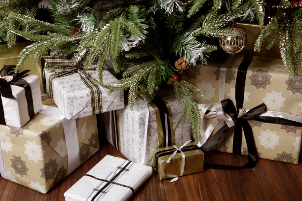 istock gifts and presents under a beautiful christmas tree 2159502883