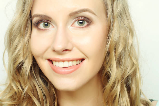 pretty blond girl smiling and laughing