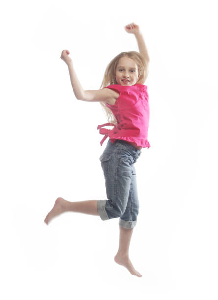 istock girl jumps on a white background 2159506819
