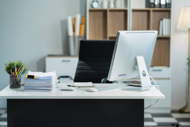 istock workspace area with laptop tablet smartphone and paperwork on the table in the office concept. 2159511724