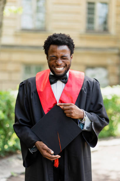istock Cheerful Young Afro-American Man at University Graduation 2159513818