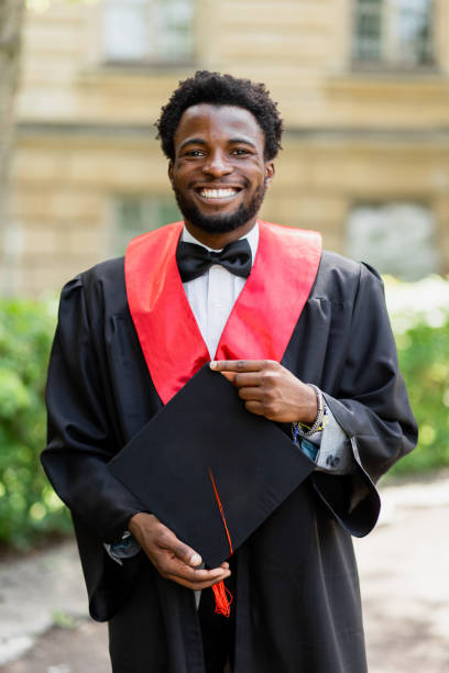 istock Cheerful Young Afro-American Man at University Graduation 2159513832