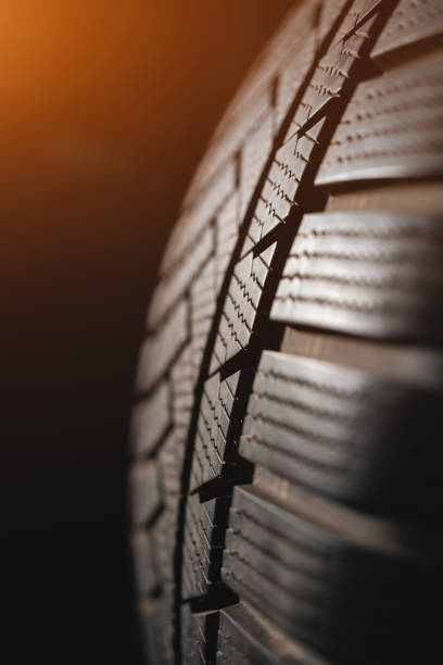 istock new car tire on black background 2159516592