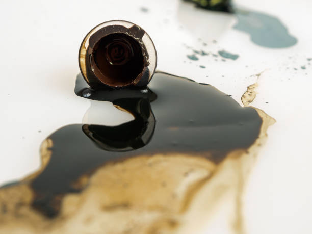 istock Spilled paint on background texture close-up 2159518017