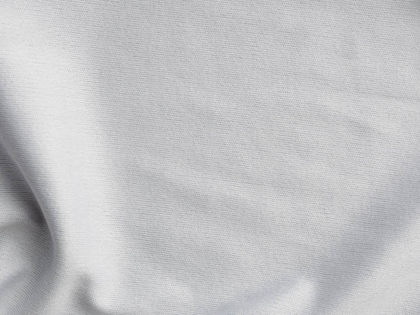 Fabric synthetic background white color close-up selective