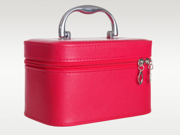 istock Red leather chest bag case with handle isolated on background 2159519352