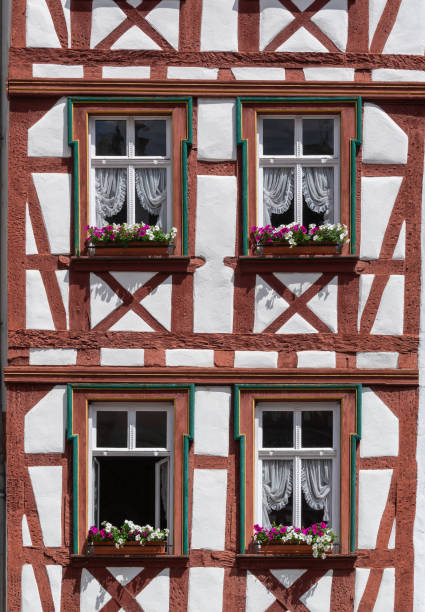 Germany, Trier, June 11, 2024 - Full frame of windows of old half-timbered house