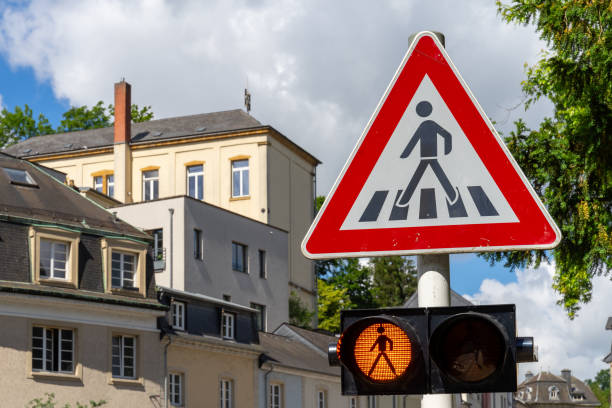 Luxembourg, Luxembourg City, June 12, 2024 - Traffic sign attention pedestrian crossing