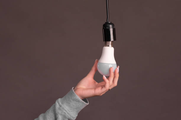 istock LED light bulb. close-up on a gray background 2159522362