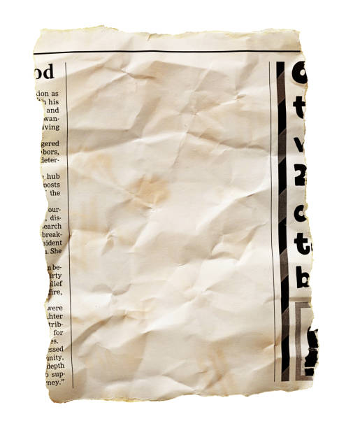 istock Dirty, crumpled newspaper clipping with blank space for your copy 2159524165