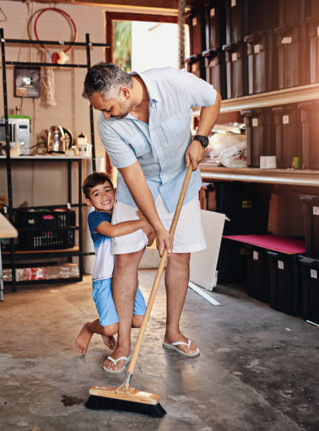The men of the house working in the garage