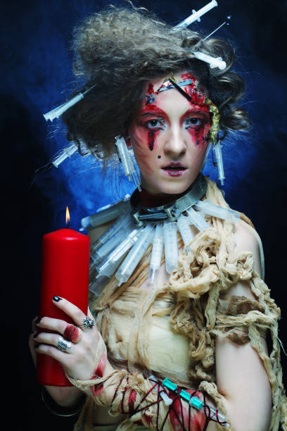 istock Young woman with creative make up. Halloween theme. 2159526105