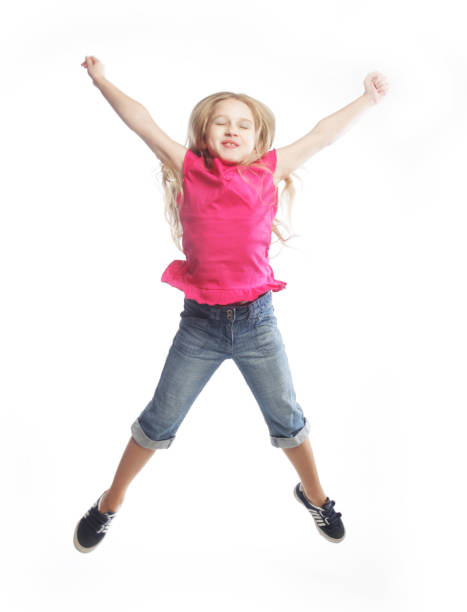 istock girl jumps on a white background 2159526345