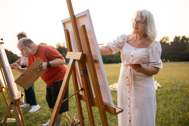 istock Artists painting outdoors in nature 2159528371