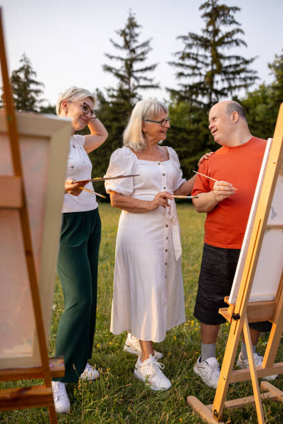 istock Artists painting outdoors in nature 2159529086