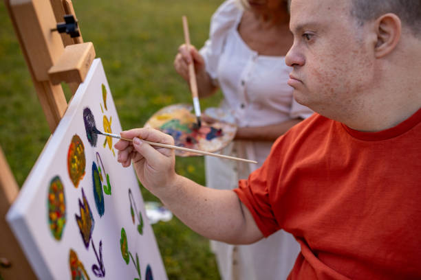 istock Friends painting in nature 2159529848
