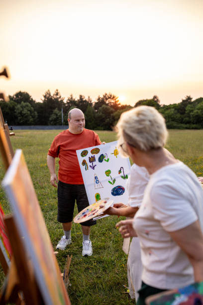 istock Man showing his painting 2159530296