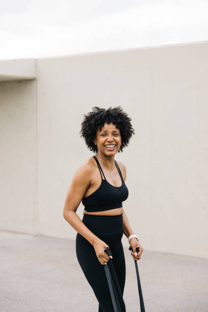 istock Sportive woman doing exercise outdoors. 2159530346