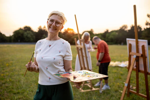 istock Woman painter with friends 2159530369