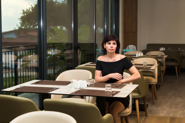 Young woman at cafe of shopping centre
