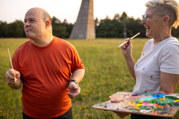 istock Friends painters having fun 2159530774