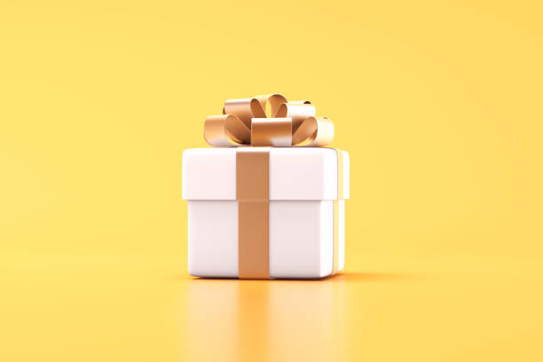 istock White gift boxe with gold ribbon 2159531662