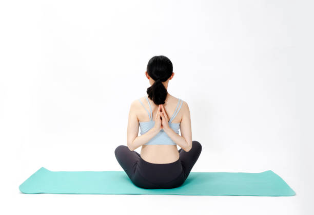 istock Beauty doing yoga with a white background 2159535419