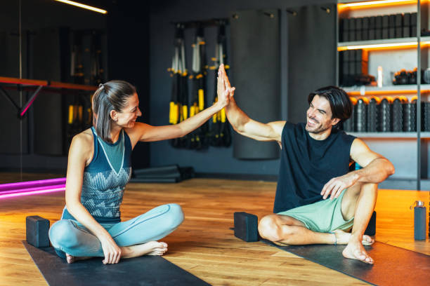 istock High five after great yoga practice 2159542208