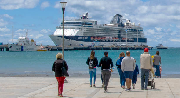 Puerto Madryn, Argentina - December 29, 2022: Sunny day at waterfront boardwalk at puerto madryn city, chubut province, argentina