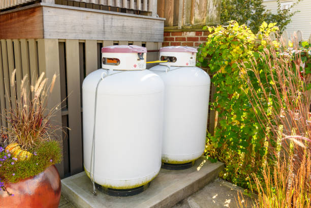 istock Propane cylinders in a house backyard on a sunny day 2159549470