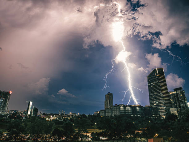 istock Thunder and Lightning in city at night 2159550541