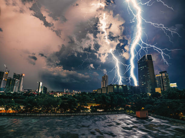 istock Thunder and Lightning in city at night 2159550542