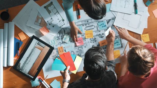 istock Top view of skilled engineer working together to design building. Symposium. 2159552328