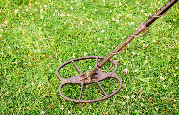 istock Treasure hunter with a metal detector in the mountains. 2159553401