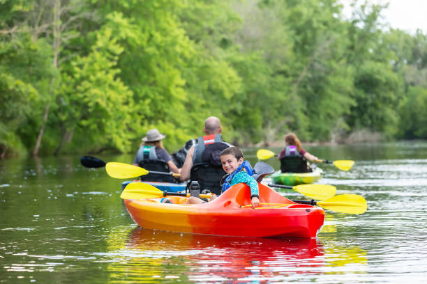 istock Family Kayaking on River on Summer Evening 2159554830