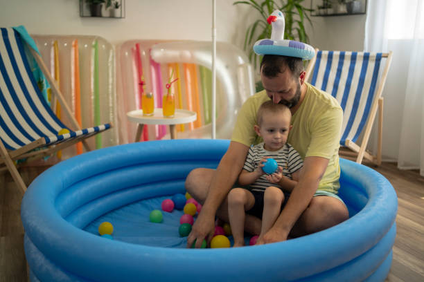 istock Cool Father and Son at Home Beach 2159559948