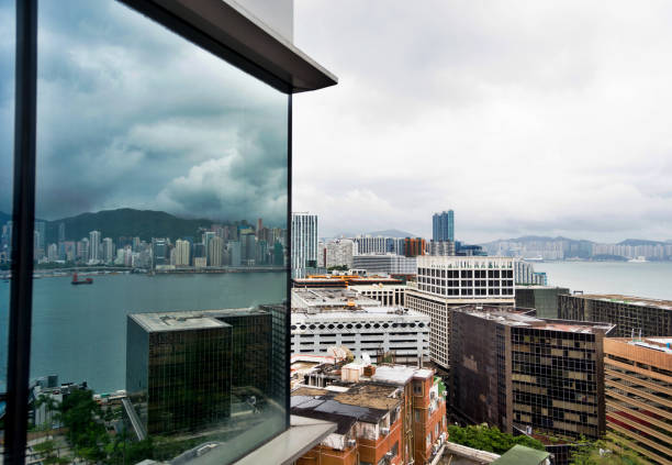 Cityscape reflecting on glass windows.