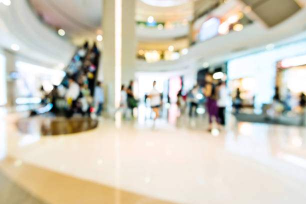 Defocused blurred background of modern shopping mall.
