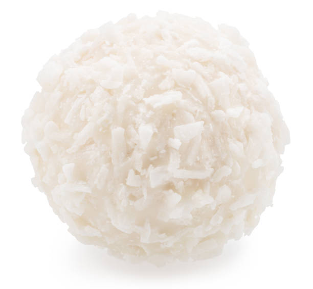 istock Round white chocolate candy covered with blanched coconut on white background. File contains clipping path. 2159561164