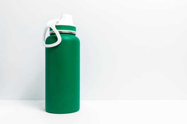 Backdrop Reusable Sport Green Water Bottle, Protein Shaker On White Gray Background. Copy Space For Text. Tumbler, Product Template. Horizontal Plane.
