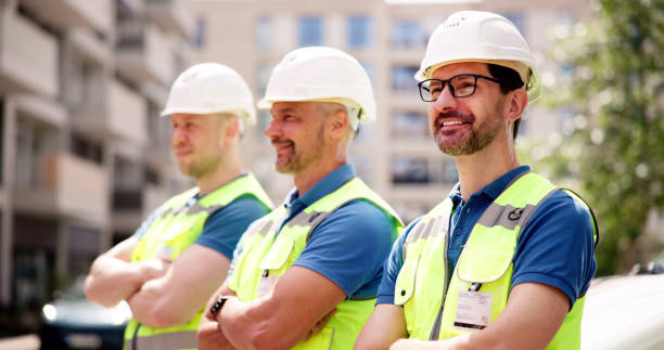 istock Building a Bright Future Together: A Joyful Construction Manager Guides His Team 2159561953