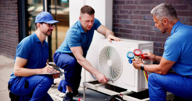 istock Experienced HVAC technician inspecting commercial building 2159561988